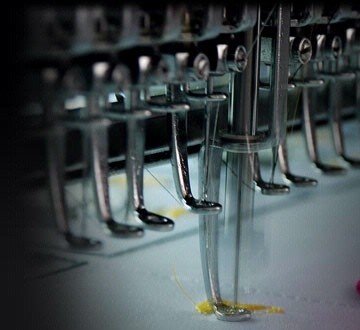 Multi-head embroidery machine stitching